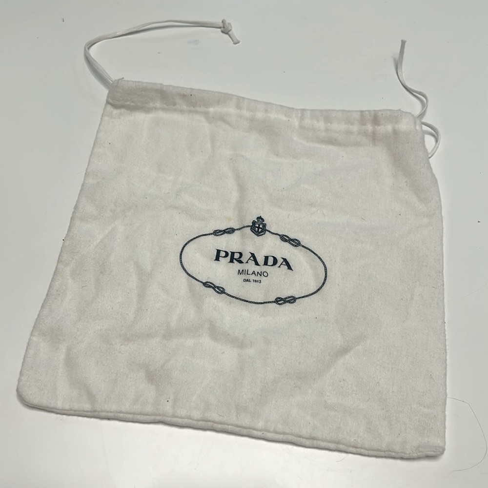 White Prada dust bag